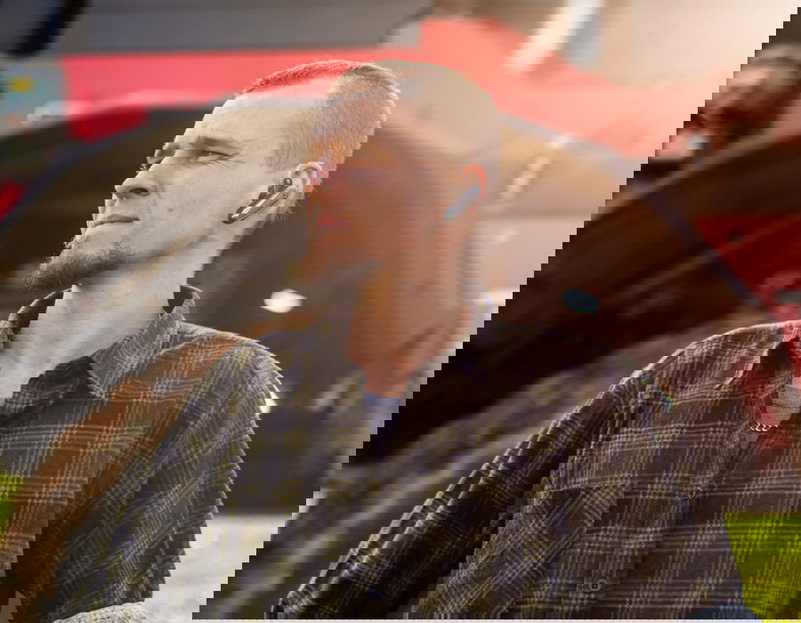 A man standing in front of an Agrifac Condor.