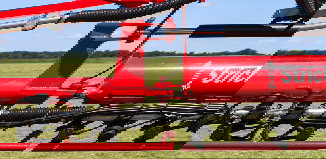 Close up view of a J boom component.