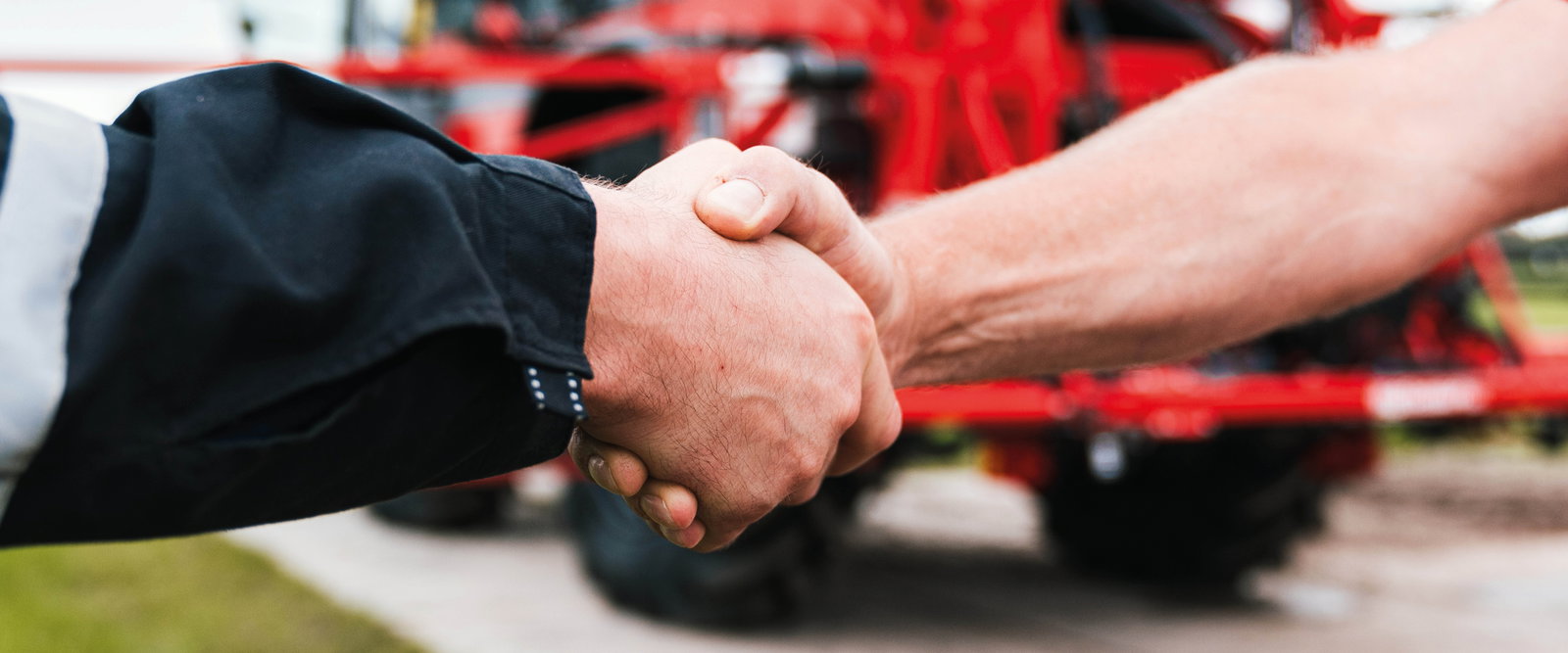 Two men shaking hands.