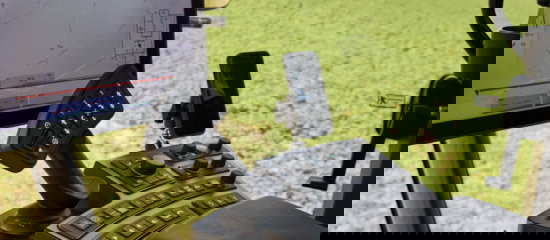 Close up of the EcoTronicPlus operating screen and armrest.