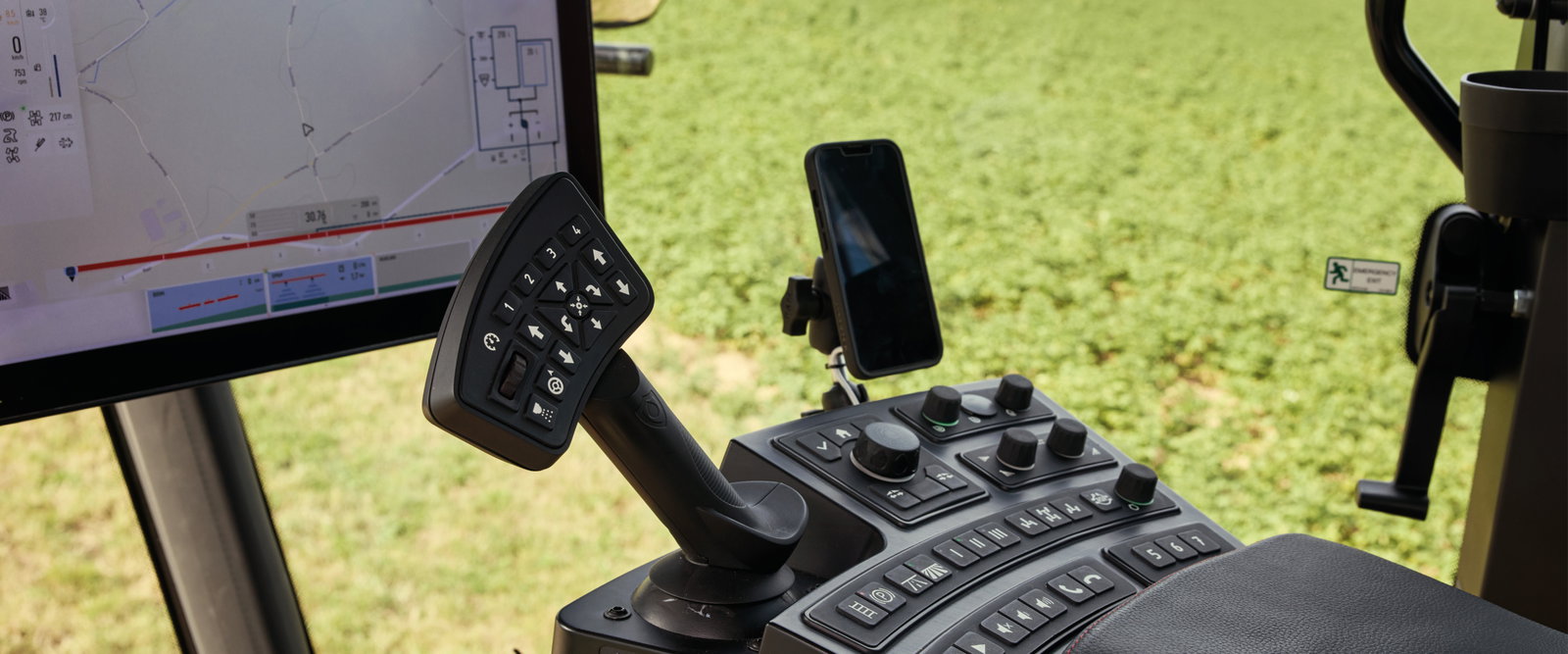 Close up of the EcoTronicPlus operating screen and armrest.